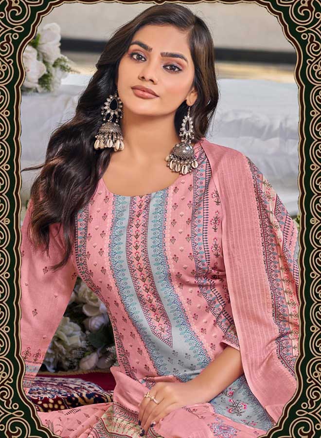 Woman wearing printed cotton unstitched suit dress material with matching dupatta and traditional ethnic design