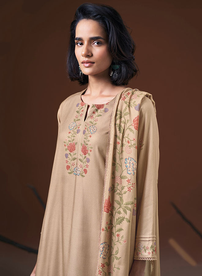 Ganga unstitched woollen Pashmina suit for women with floral embroidered top, Schiffli lace detailing and printed Pashmina shawl